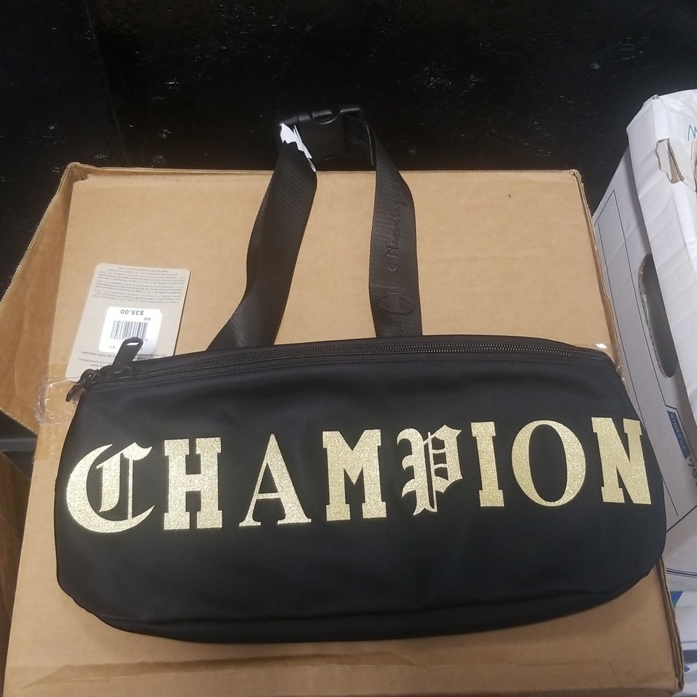 Champion Old C Sling Pack. New with tags! Retain $35.00. Black and Gold